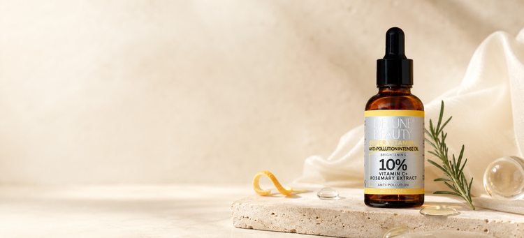 Delune Super Vitamin C 10% oil on ivory stone with silk and rosemary